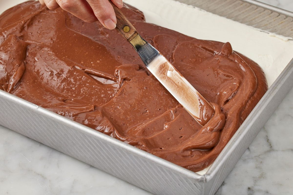 spread pudding mix over the cream cheese layer.