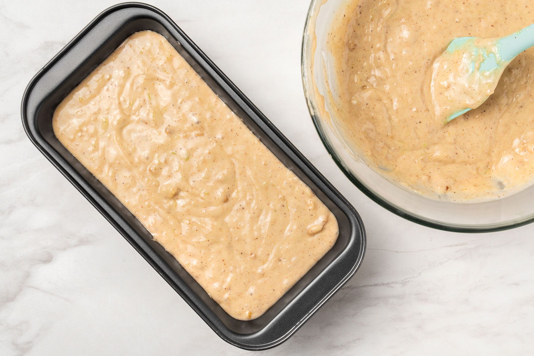 Cucumber Bread batter poured into a greased pan.
