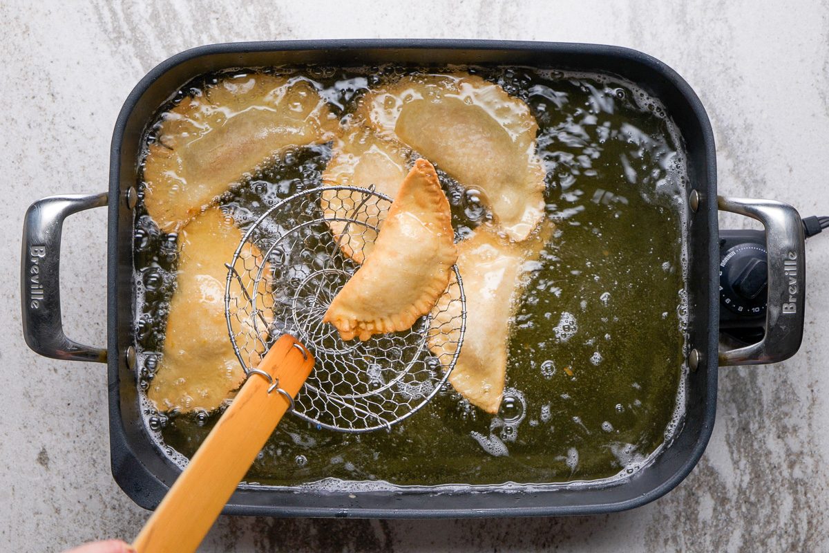 removing fried pies from oil