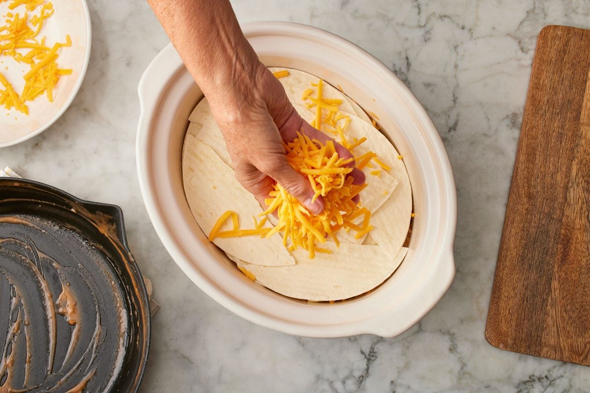 top with shredded cheddar cheese