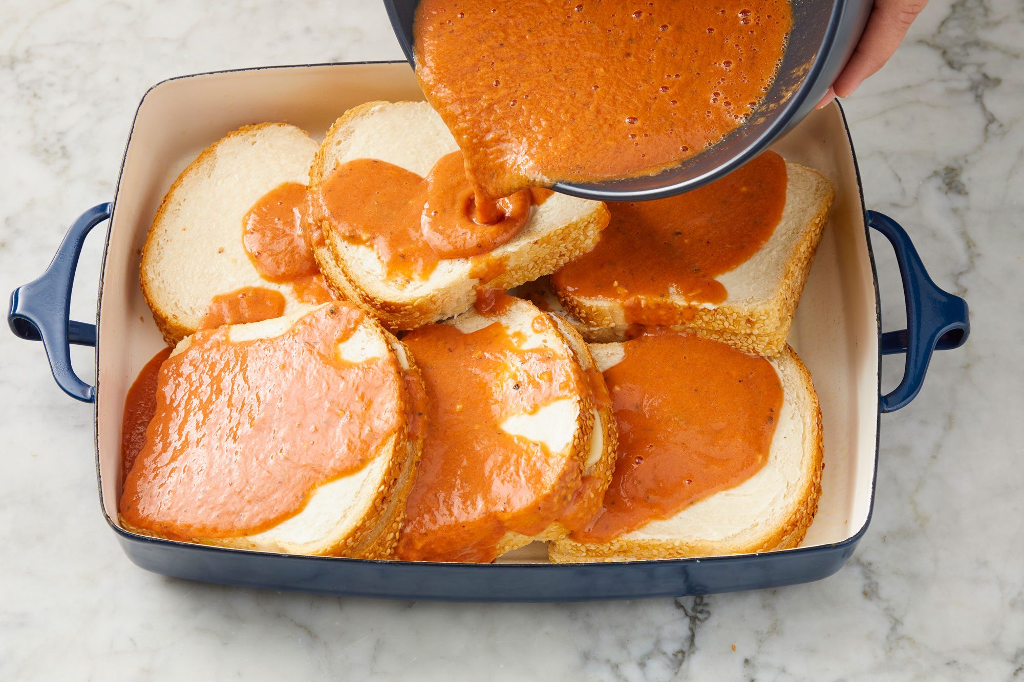 High angle shot of pour over the sandwiches; all set on a marble surface;