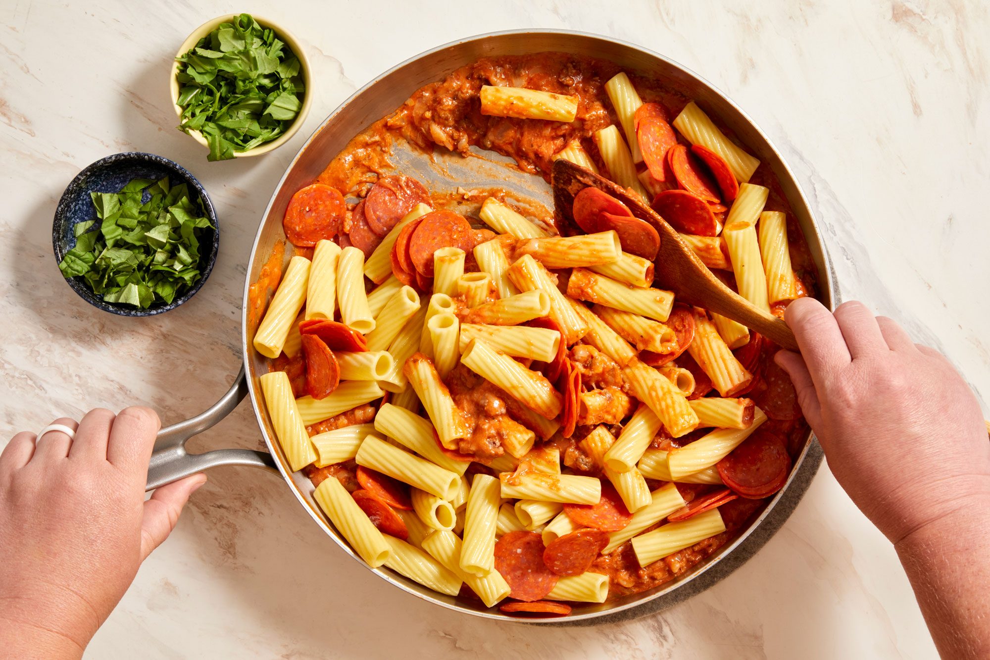 Add rigatoni and pepperoni to beef mixture.