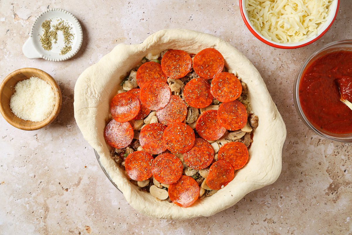 pepperoni layered over pie filling