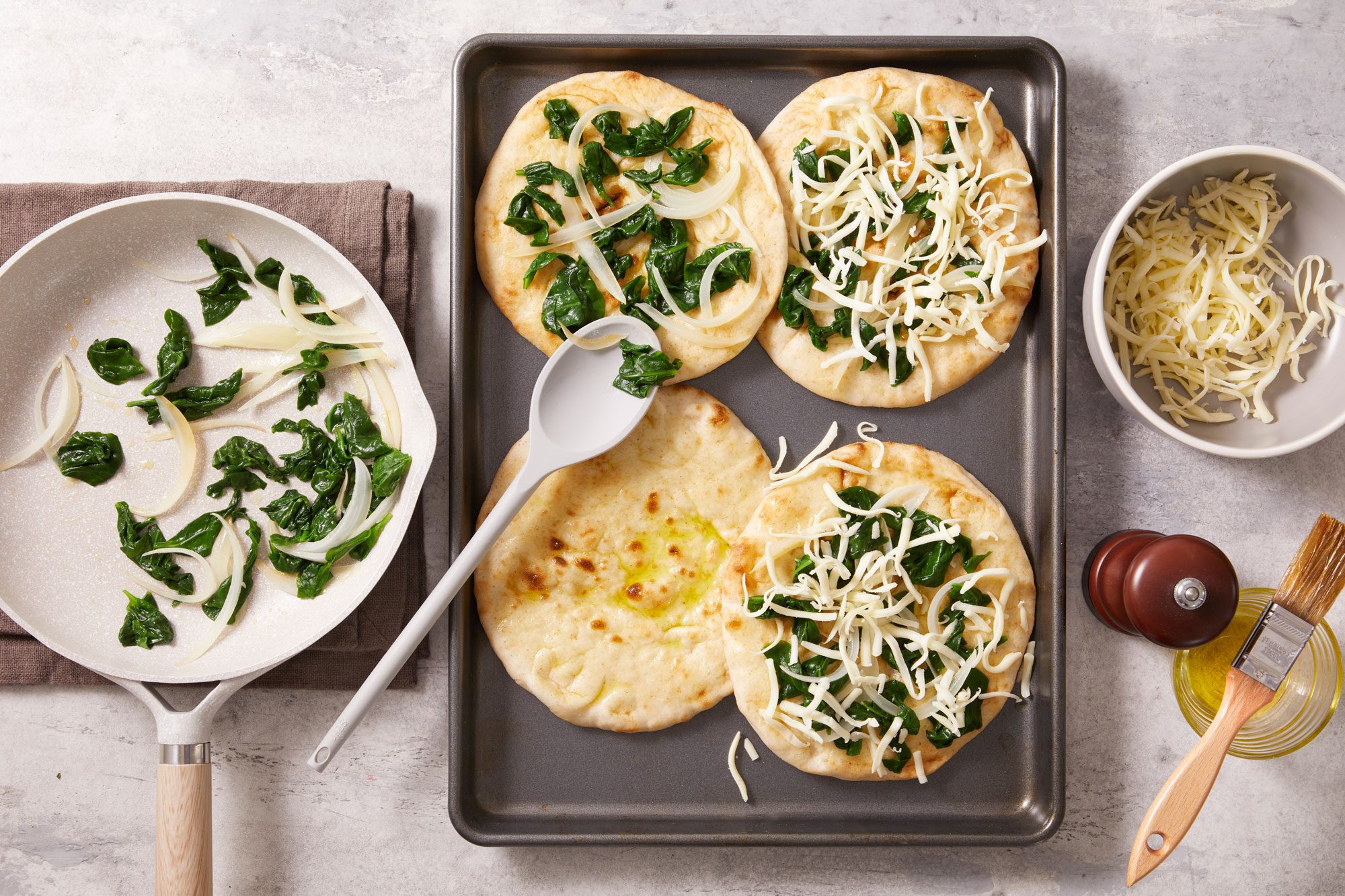 Layer with spinach onion mixture and cheese.