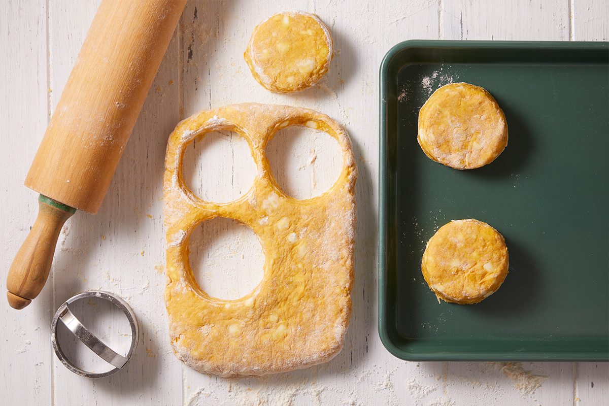 Cut the dough using biscuits cutter for Pumpkin Biscuits 