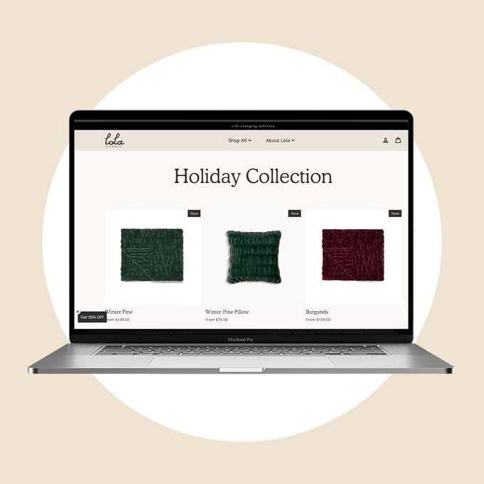 Lola Blakets homepage on a laptop