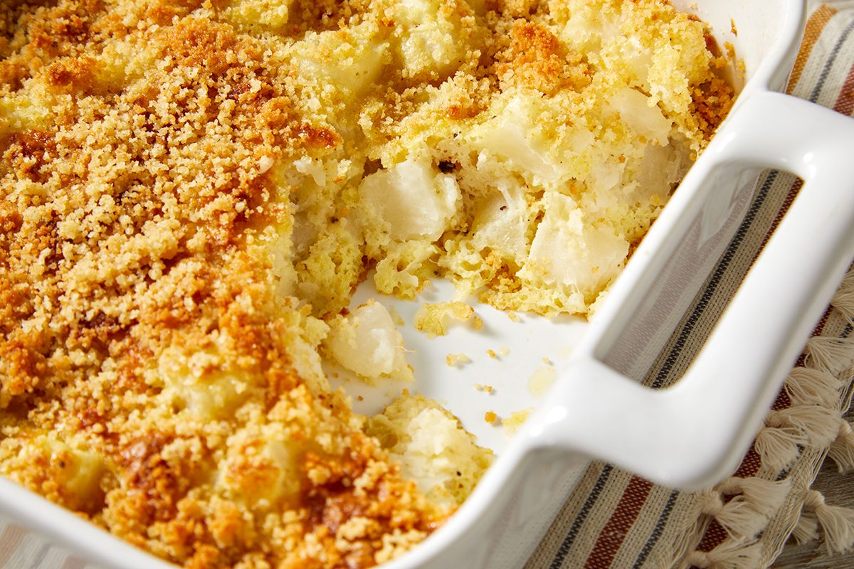 Close-up of the Turnip Bake showing a crispy, golden breadcrumb topping over creamy turnip filling