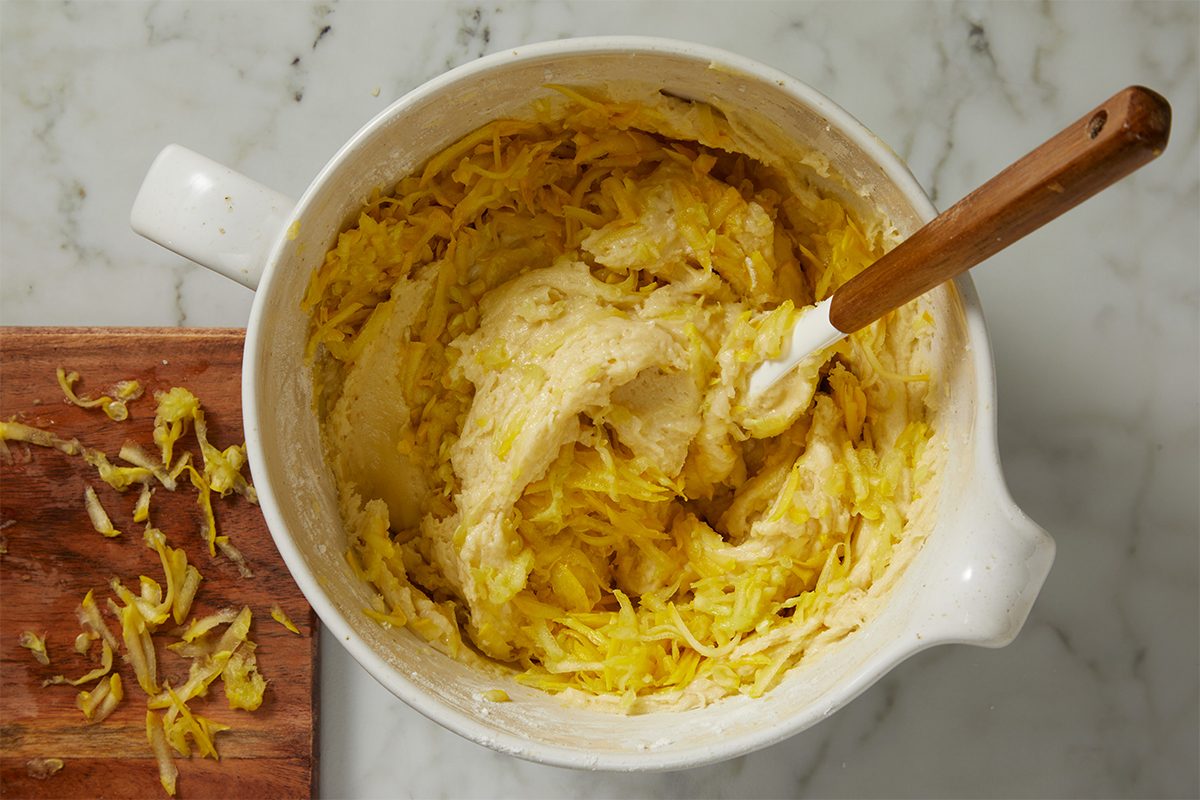 Stir in the shredded squash in Yellow Squash Cake batter