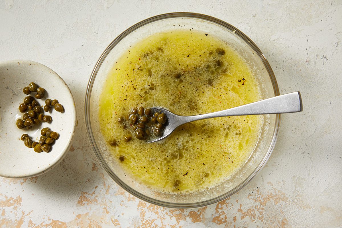 Microwave, uncovered, until butter is melted. Stir in capers.